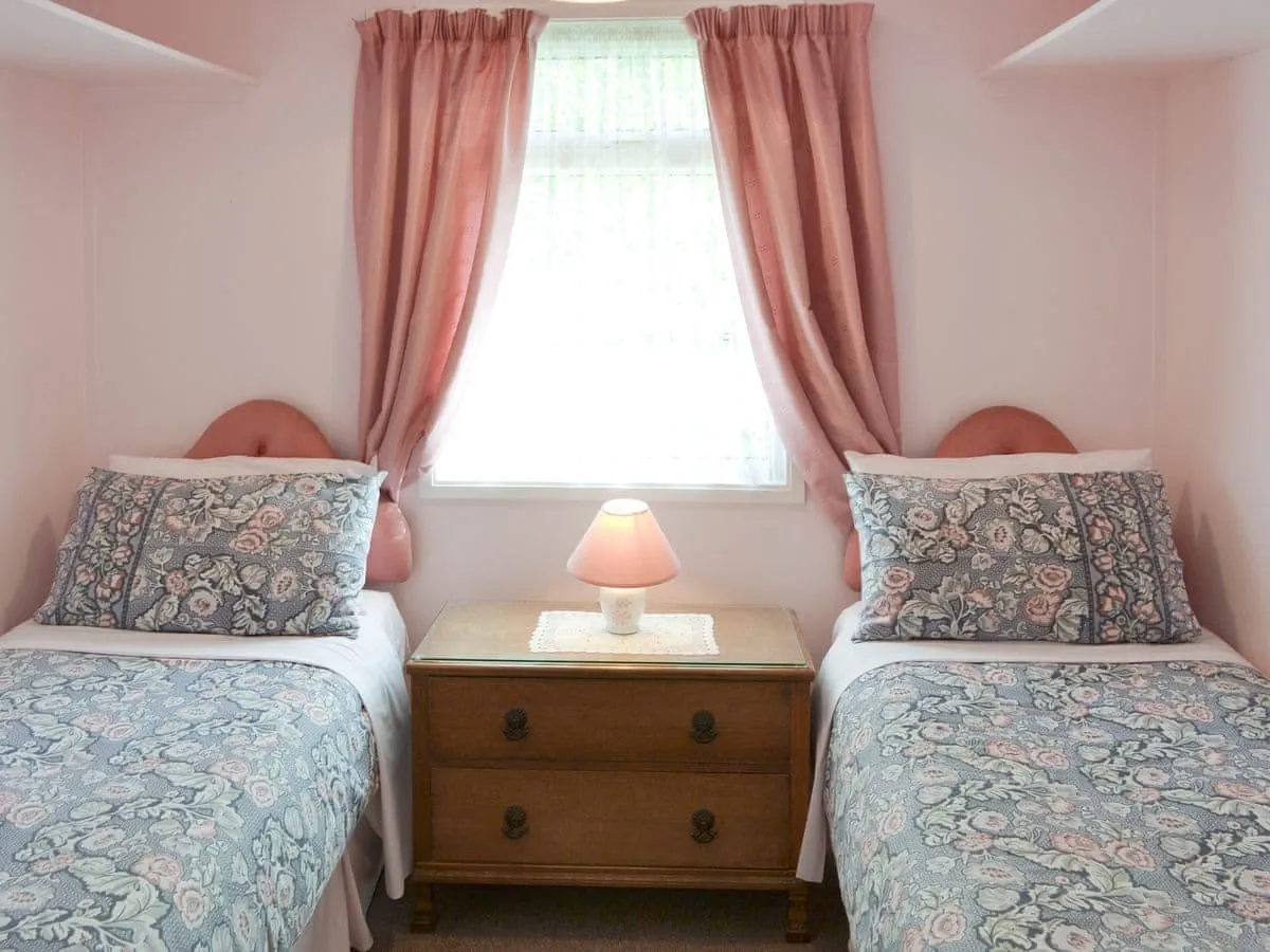 Twin bedroom setup suitable for kids or family